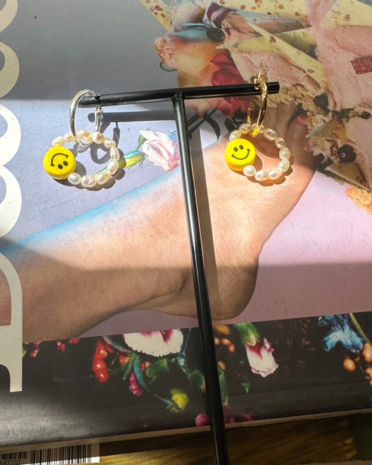 Mini pearls and smile earrings.