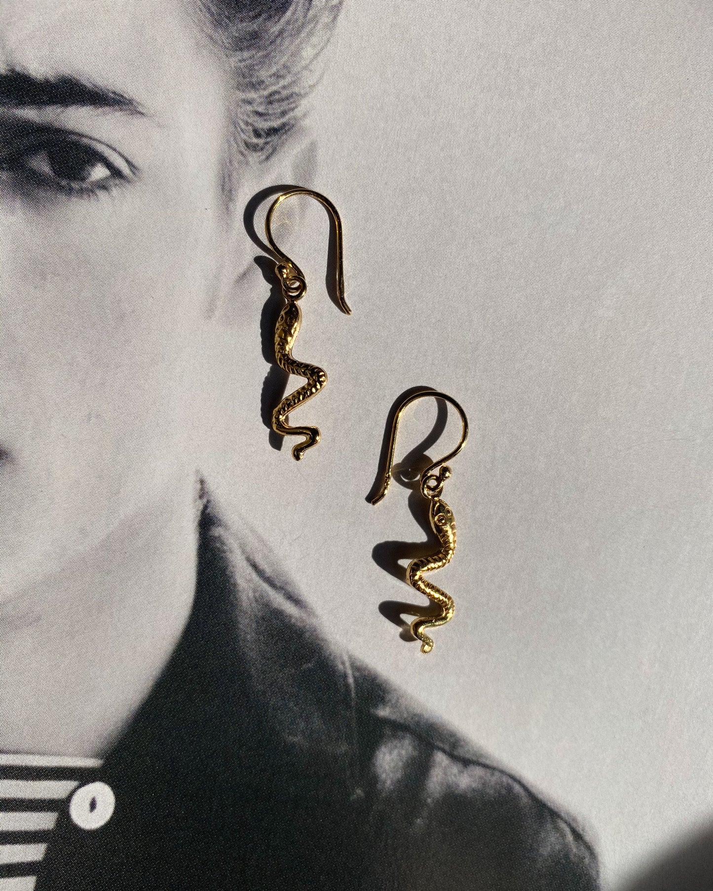 The serpent earrings.