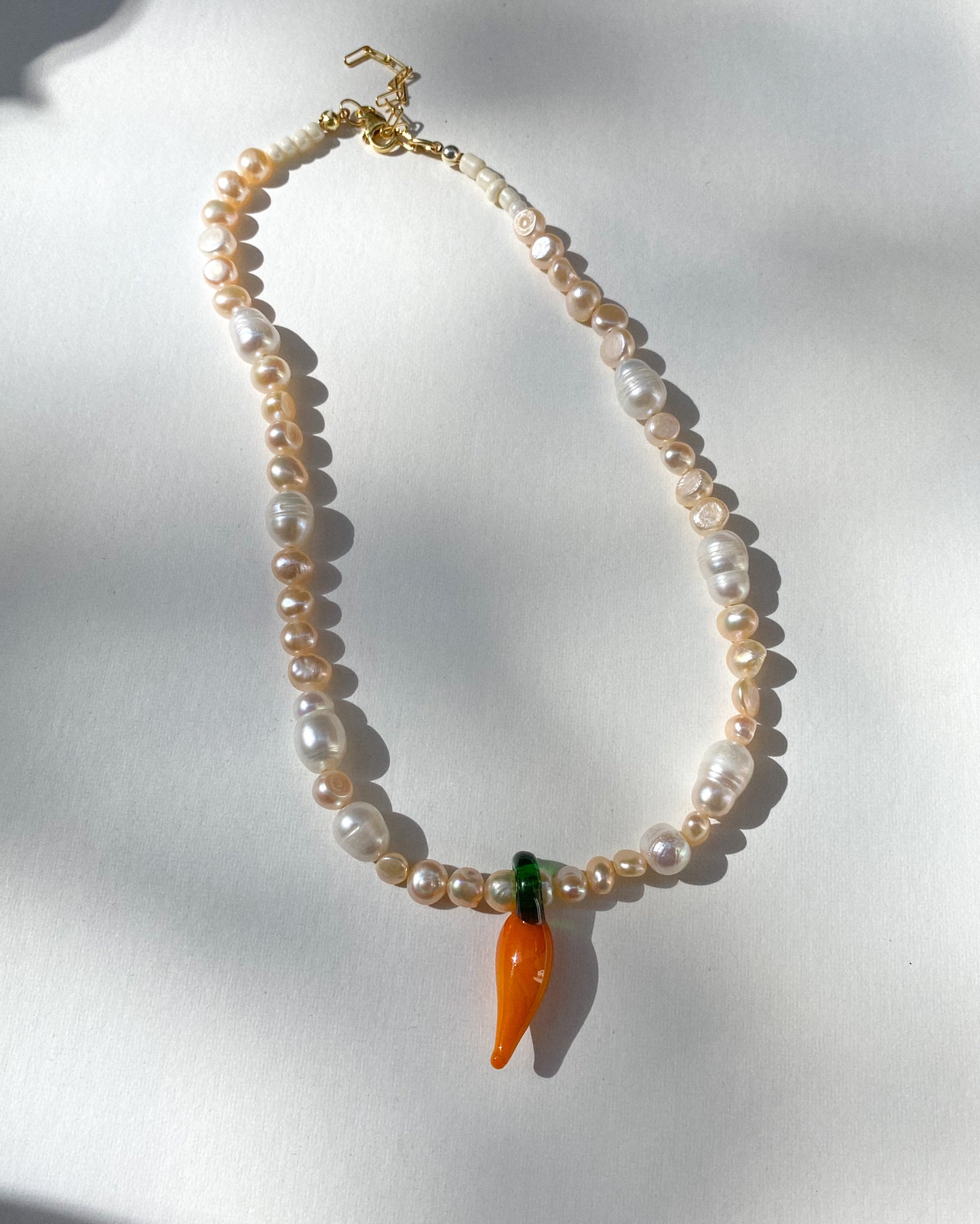 The carrot pearl necklace